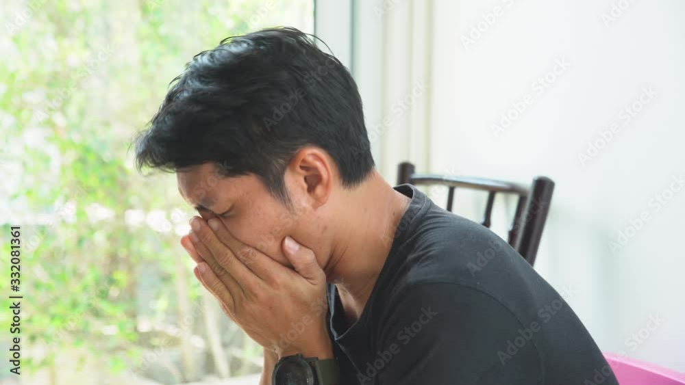 Caucasian male coughs in his elbow. Correct sneezing. Concept of stop spread of the virus.Man sneezing use a napkin. Precaution and prevention ways to stop the pandemic virus from spreading.