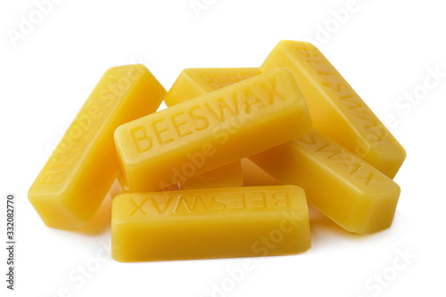 Beeswax on a white background.Beeswax blocks. Natural beeswax.