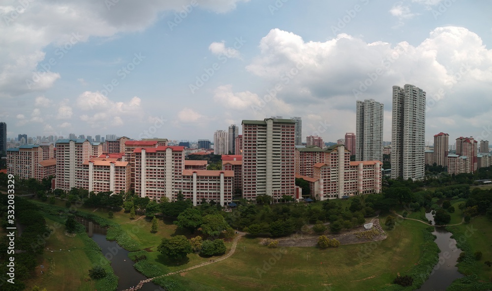 high panoramic view of a residential area surrounded by the neighborhood park