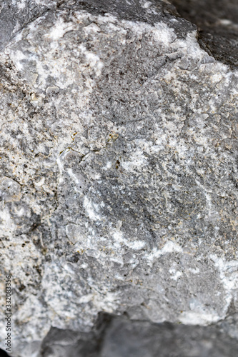 Structured surface of a grey rock in the nature  © Markus