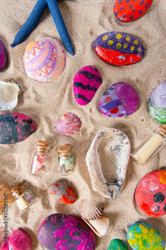 painted colorful sea shells and stones