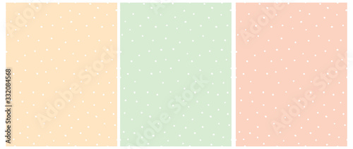 Simple Hand Drawn Irregular Dots Vector Pattern. White Dots Isolated on a Light Yellow, Mint Green and Blush Pink Background. Infantile Style Abstract Geometric Dotted Seamless Vector Print.