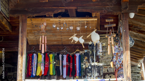 Wooden house from the 19th century selling colorful items for tourists. The items are traditional for bulgarian culture. Zheravna is ancient village.