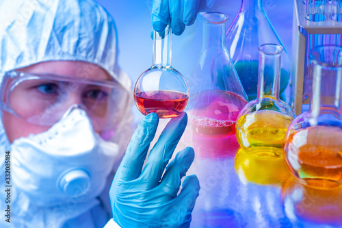 A chemist examines a substa...