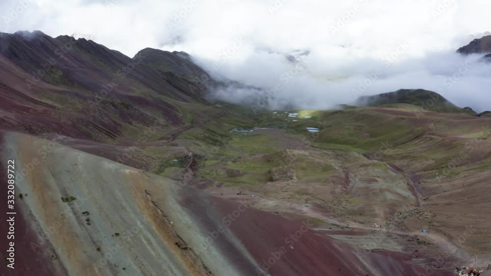Peru Rainbow Mountain Vinicunca Montana de Colores 4K Drone_Lateral Move Right to Left Starting on Valley and going behind Vinicunca Rainbow Mounta Peru Rainbow Mountain Vinicunca Montana de Colores 4K Drone_Lateral Move Right to Left Starting on Valley and going behind Vinicunca Rainbow Mounta
