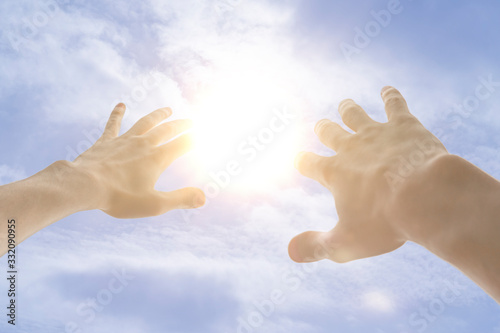 human hand cover himself from the sun light strike from the sky, first person view