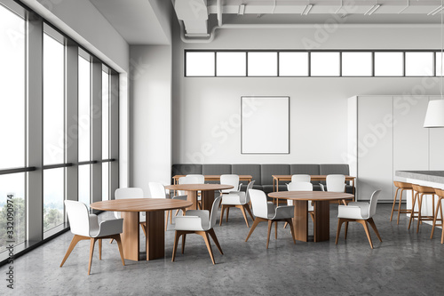 White restaurant interior with poster