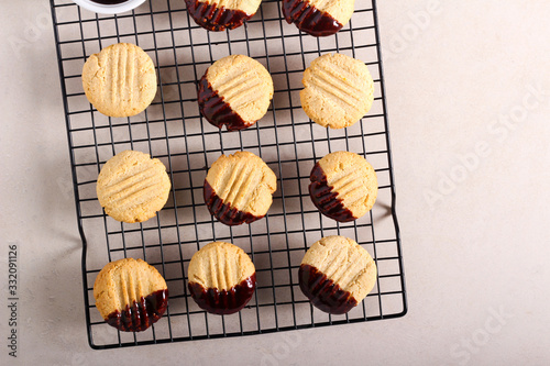 Wholemeal wheaties cookies, with chocolate glaze photo
