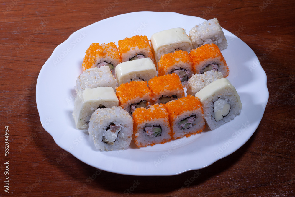 large set of rolls on a plate large set of rolls on a plate