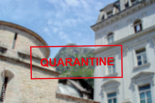 Text Quarantine against the background of medieval architecture in Montenegro .