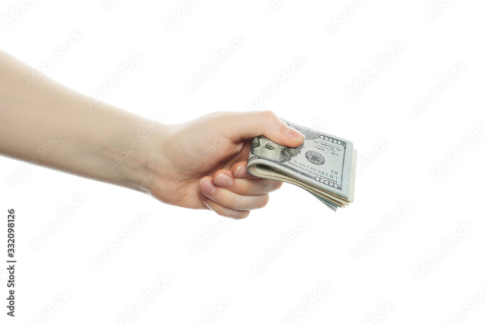American dollars cash money in male hand isolated on white background. US Dollars 100 banknote American dollars cash money in male hand isolated on white background. US Dollars 100 banknote