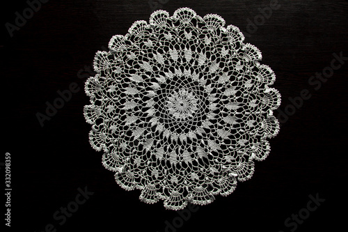 Cuadro en lienzo Crocheted napkin on a dark table