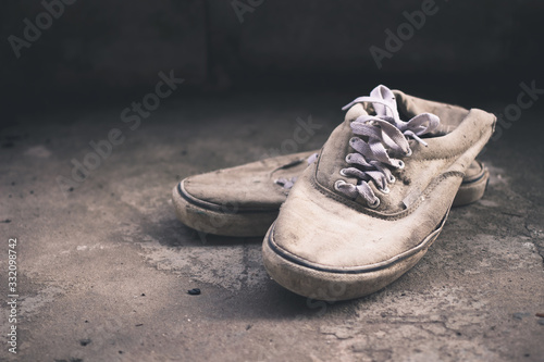 old sneaker on street