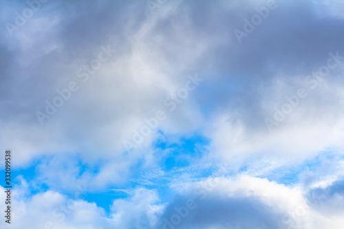 The blue sky peeks through the clouds