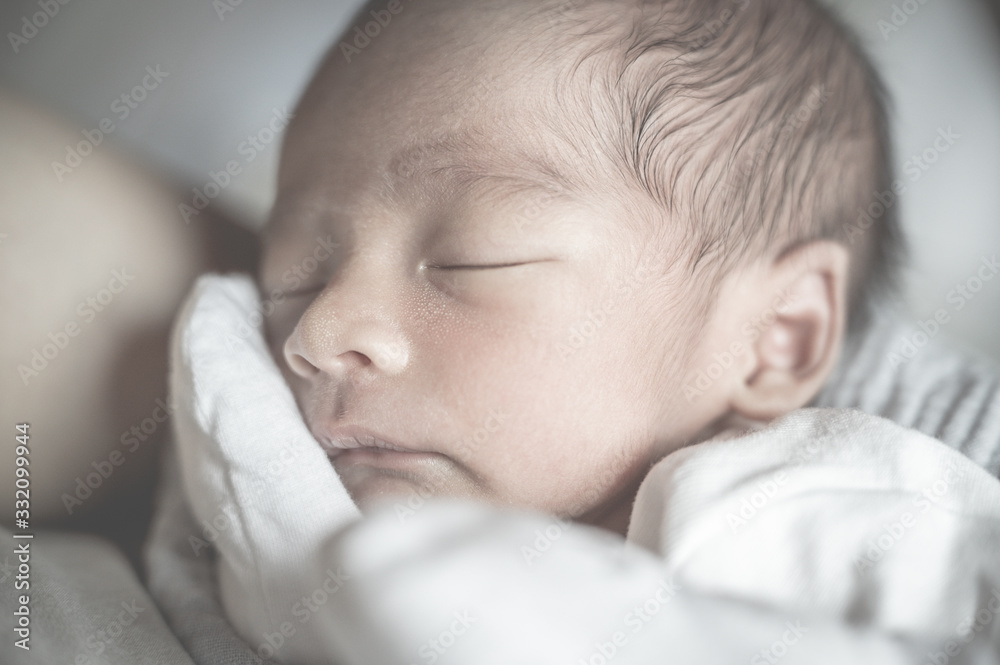 Newborn baby sleeping in mother hug.Family and love concept.Asian kid. Newborn baby sleeping in mother hug.Family and love concept.Asian kid.