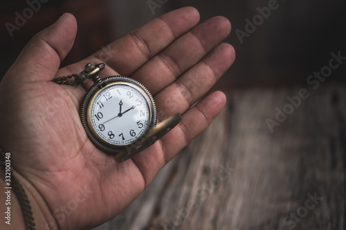 vintage pocket watch on hand