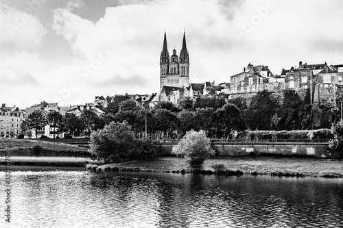 Panorama of the city of Angers, France with Saint Maurice Cathedral of Angers and the old town on the banks of the river Maine in black and white