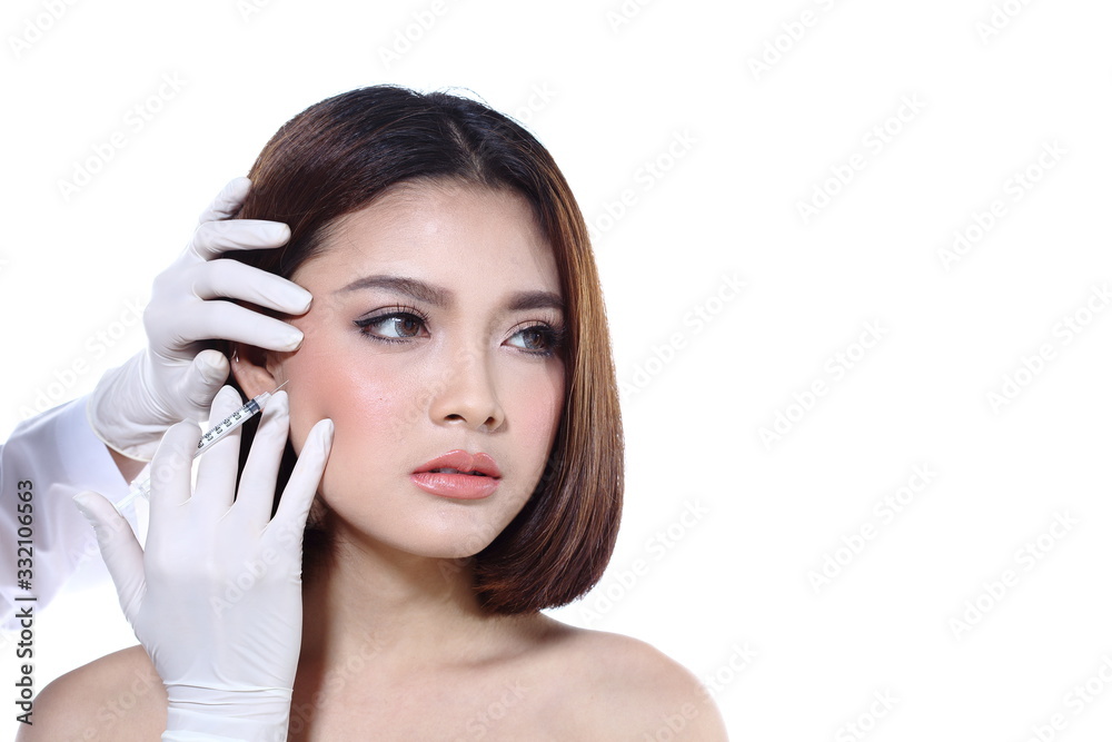 Beautiful Asian woman want to check eye, nose, eyebrow, forehead, cheek, jawline before plastic surgery, studio lighting white background copy space for text logo Beautiful Asian woman want to check eye, nose, eyebrow, forehead, cheek, jawline before plastic surgery, studio lighting white background copy space for text logo