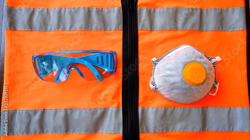 Dust Protection mask and glasses on safety jacket