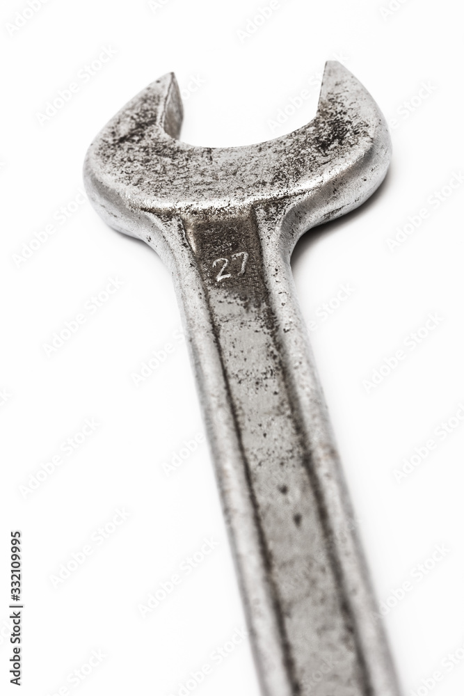old wrench on white background old wrench on white background