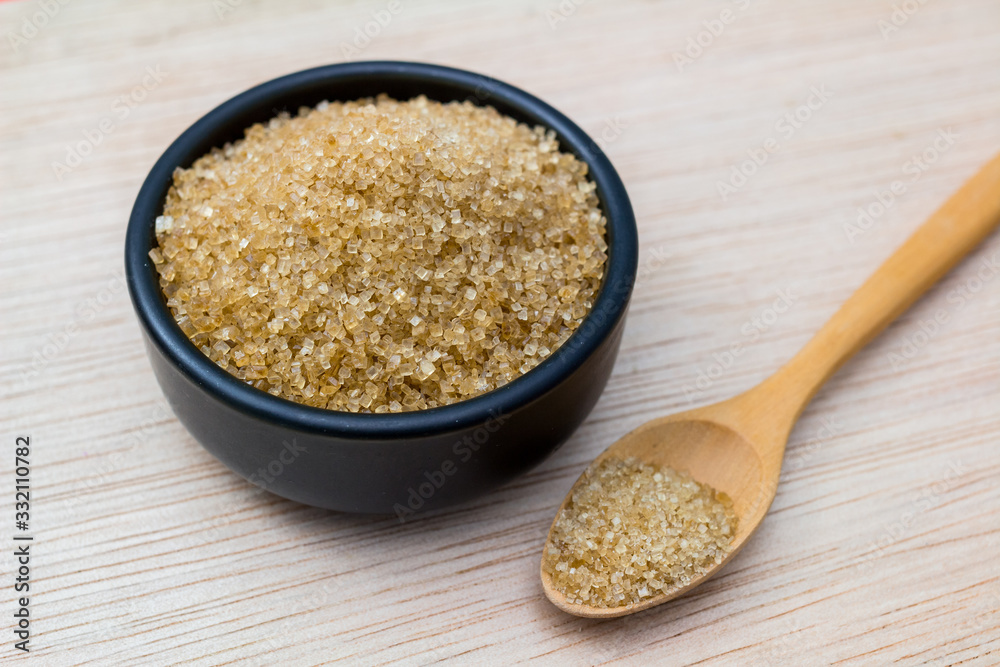 sugar in bowl on wooden table sugar in bowl on wooden table