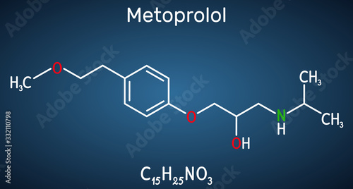 Metoprolol,  C15H25NO3 molecule. It is used in the treatment of hypertension and angina pectoris. Structural chemical formula on the dark blue background