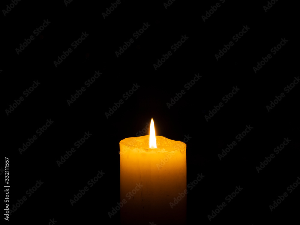 Centered candle thick scum with black background Centered candle thick scum with black background