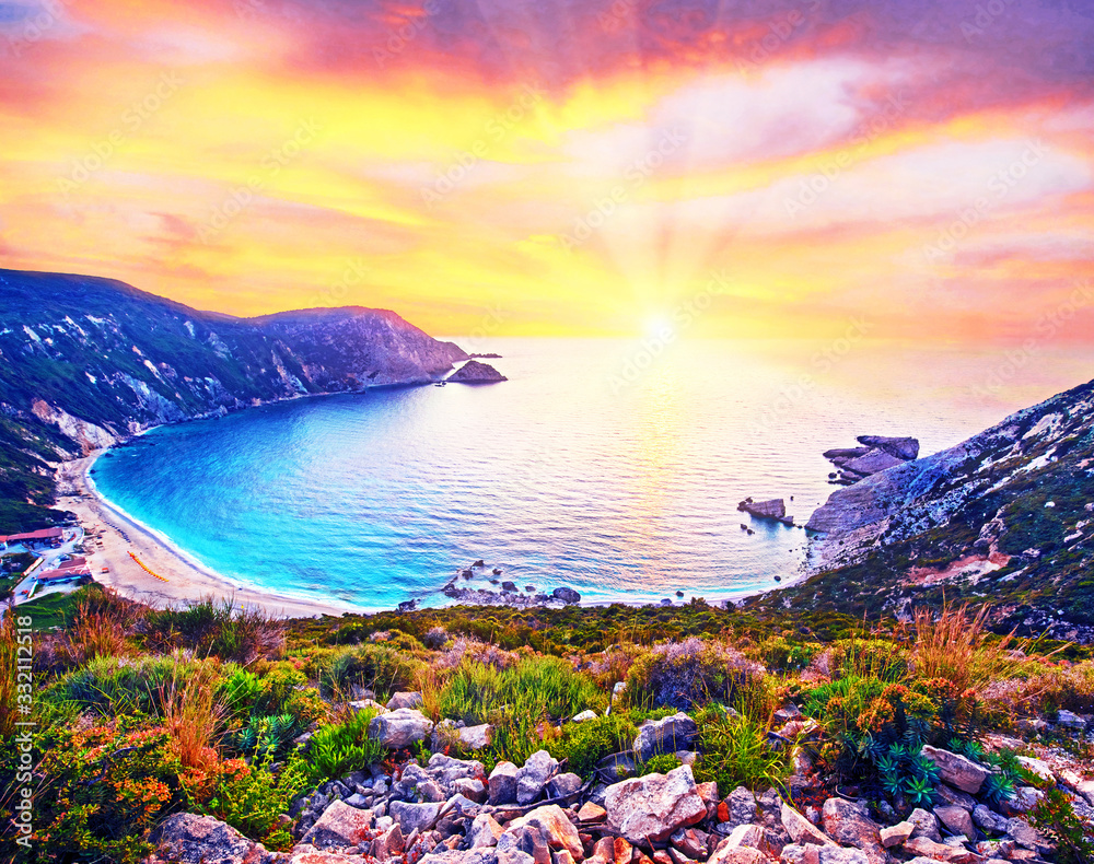 Fantastically fabulous mystical stunning magical landscape with the beach at sunset in Petani Beach, Kefalonia, Greece. Amazing places. Tourist Attractions.
