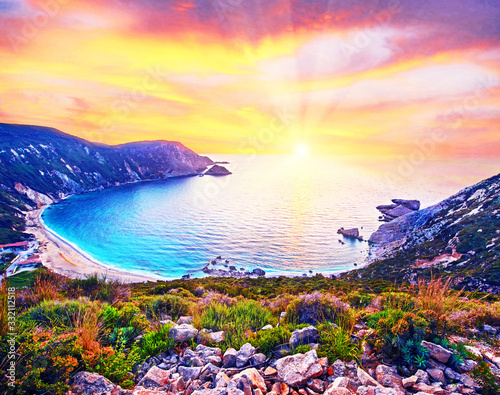 Obraz na płótnie Fantastically fabulous mystical stunning magical landscape with the beach at sunset in Petani Beach, Kefalonia, Greece. Amazing places. Tourist Attractions. w salonie