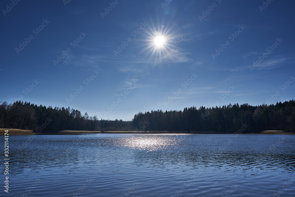 Landscape Picture of the lake in the middle of nowhere in beautiful winter cold sunny day in Czech moravian highland in Czech republic. Nice clear country perfect for hiking or  spend holiday there.