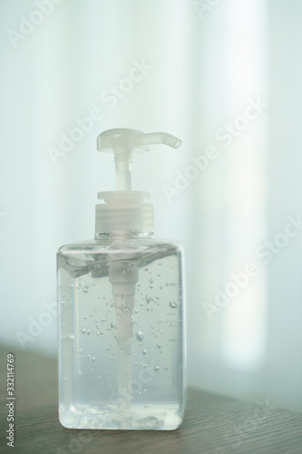 Transparent hand sanitizer gel dispenser  for hand hygiene. Clear sanitizer in pump bottle, for killing germs, bacteria and virus.
