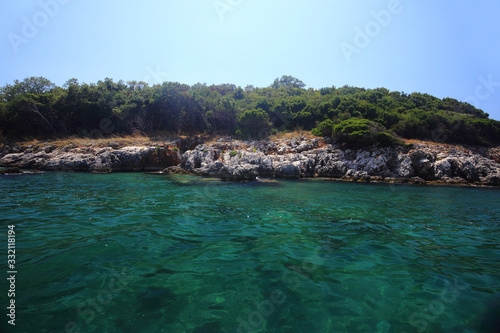  Island in Albania. Blue water.