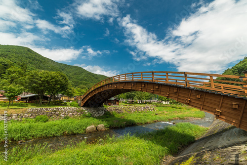 Japanese wooden footbridge in Narai historic village in Japan © Olga K