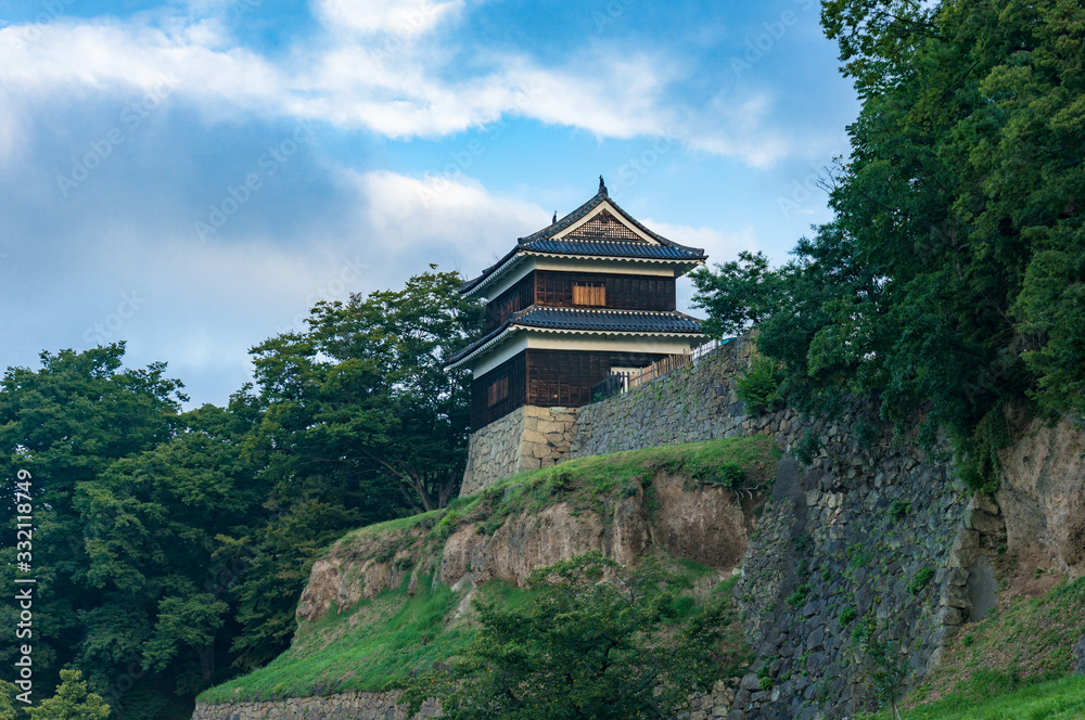 Traditional Japanese castle on stone hill. Ueda castle historic building Traditional Japanese castle on stone hill. Ueda castle historic building