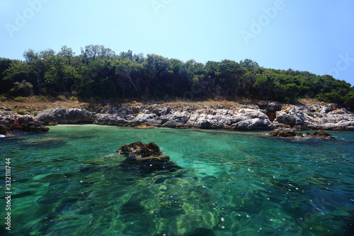 Fototapeta Naklejka Na Ścianę i Meble -   Island in Albania. Blue water.