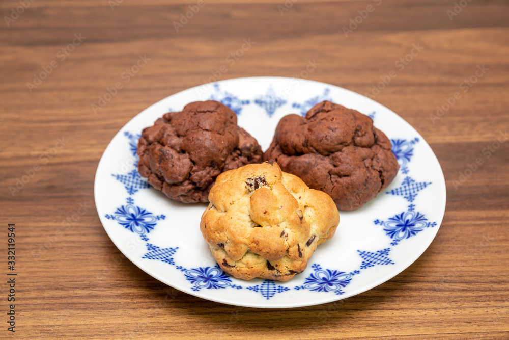 Chocolate cookies on wooden table Chocolate cookies on wooden table