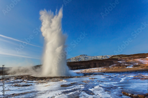 The Great Geysir erupting on a daily landscape, Golden circle, Iceland