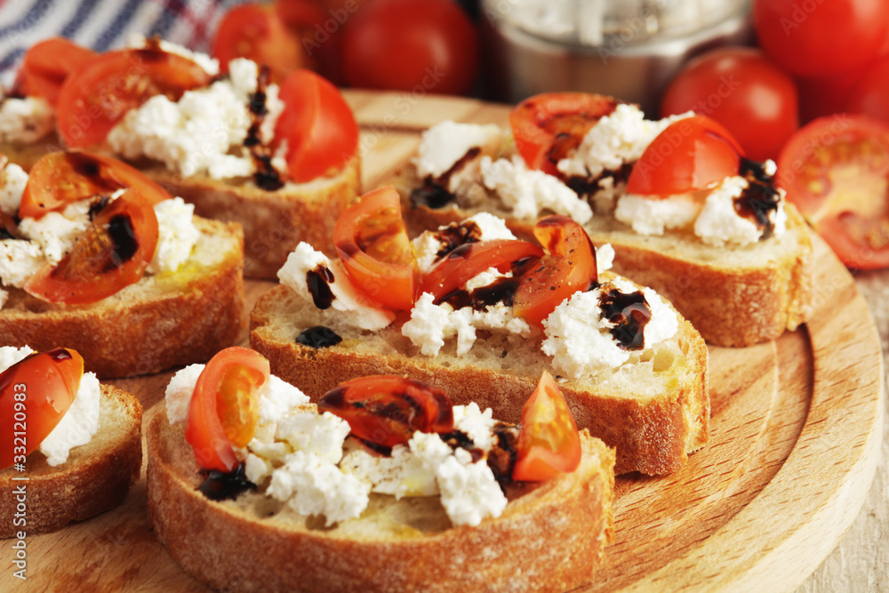 Sandwiches with tomatoes, homemade cheese, olive oil and balsamic sauce Sandwiches with tomatoes, homemade cheese, olive oil and balsamic sauce
