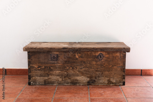 Old wooden chest with two metal locks