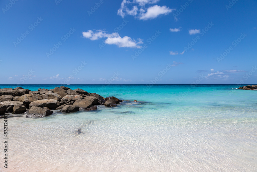 Rocks in the ocean, off the Caribbean island of Barbados Rocks in the ocean, off the Caribbean island of Barbados