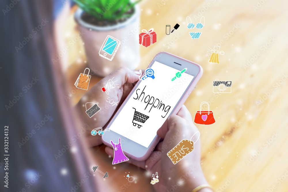 Fototapeta premium woman holding a smartphone in the hands of a white screen