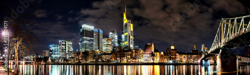 Frankfurt, panaorama of the skyscrapers of the city's business center and Eiserner Steg bridge