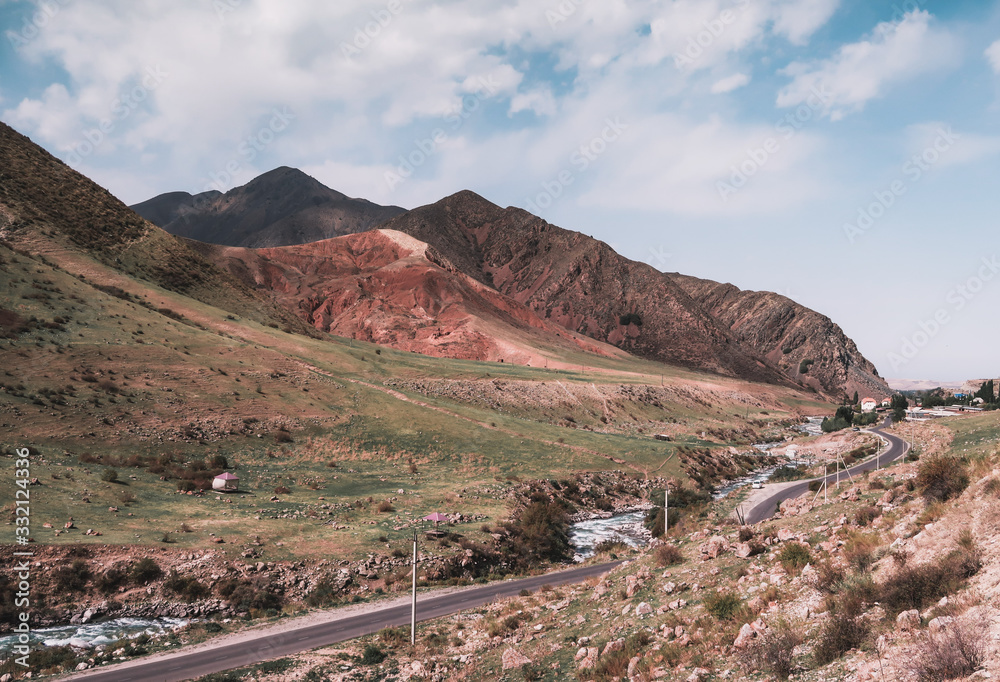 Red mountains range and the mountain road Red mountains range and the mountain road