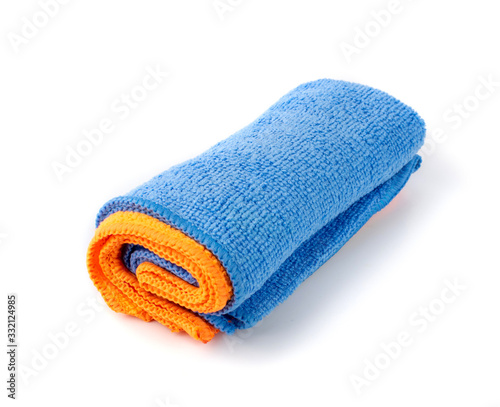 Rolled Blue Microfiber Cleaning Cloth Isolated on White Background
