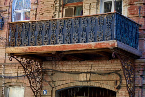 Balcony of an old building with patterned lattice © AstFreelancer