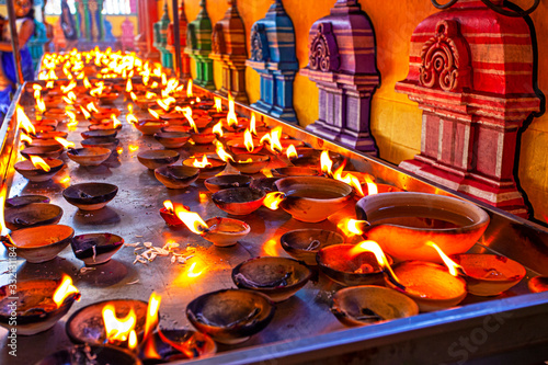 Photography Canles fire in hindu temple near the Batu Caves, Malaysia