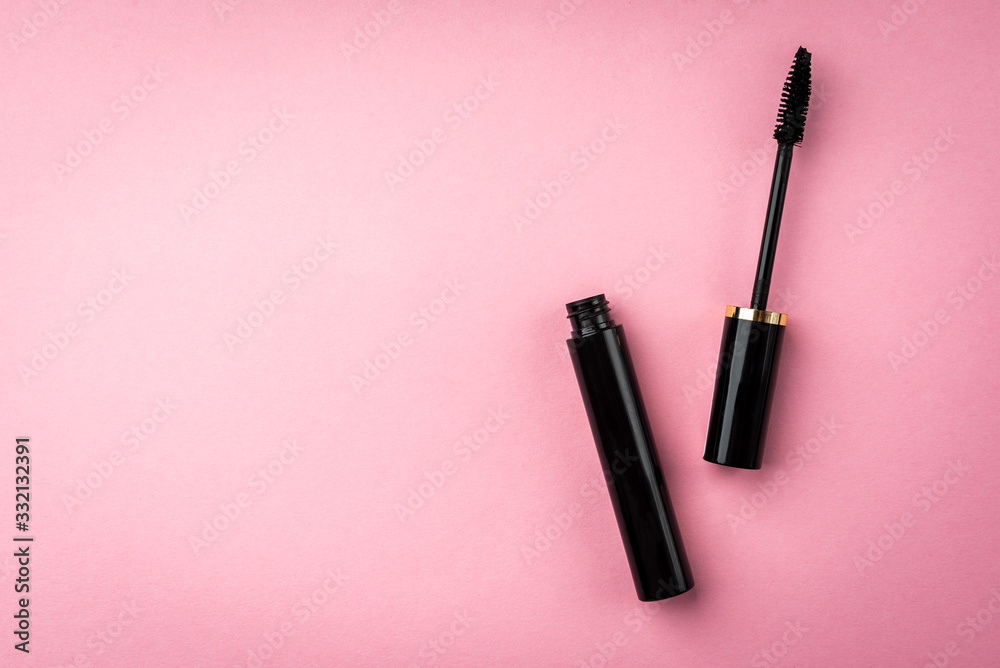 Mascara on pink background. Basic products for eyelashes makeup. Mascara on pink background. Basic products for eyelashes makeup.