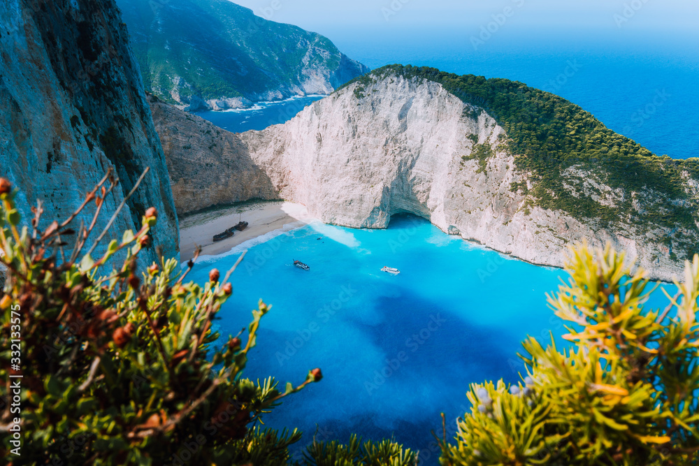 Obraz premium Navagio beach at Zakynthos island, Greece. Stranded panagiotis freightliner ship in beautiful blue lagoon