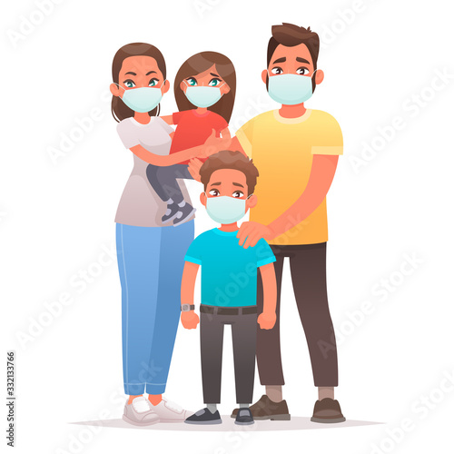 Family quarantined. Coronavirus protection. Dad, mom, son and daughter are wearing medical masks on their faces