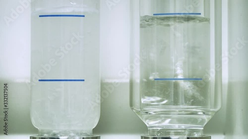 View of glass tubes filled with chemical composition to determine amount fiber photo